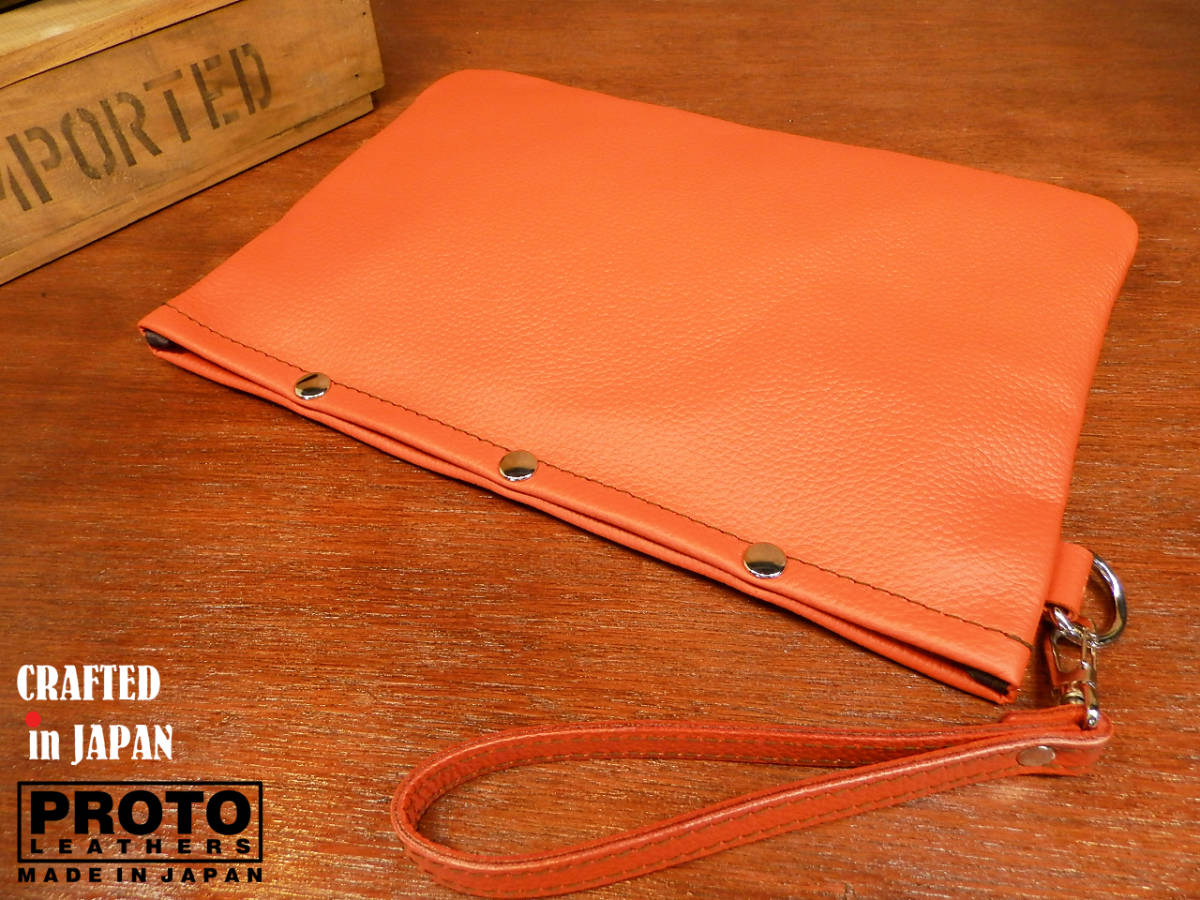 build-to-order manufacturing * vivid orange leather .. made did clutch bag. cow leather business made in Japan second bag 
