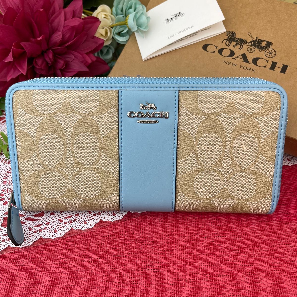 COACH＊コーチ 長財布 ベージュ シグネチャー × 水色