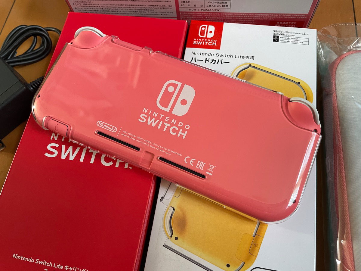  breaking the seal unused Nintendo Switch Lite nintendo switch light coral 