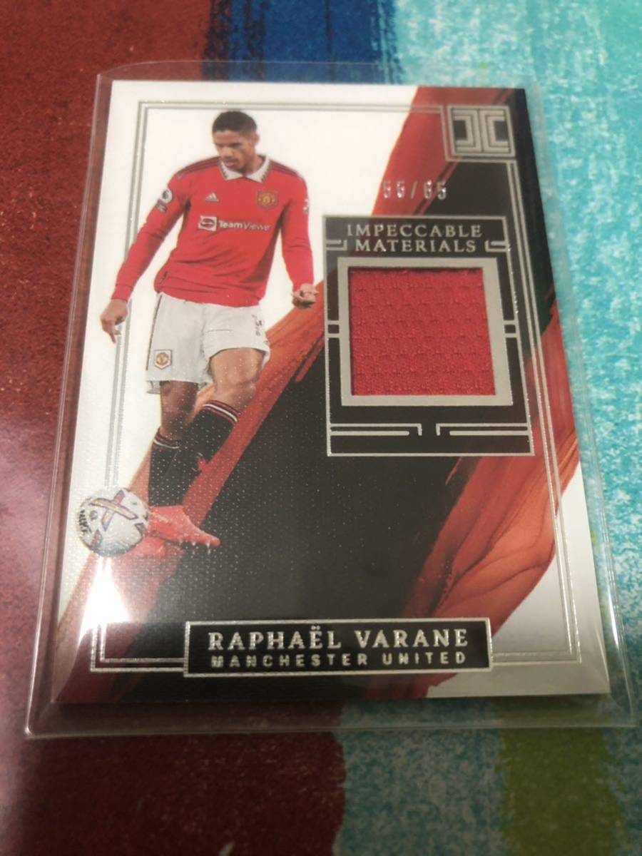 55/65 ラファエルヴァラン PANINI IMPECCABLE SOCCER MATERIALS MANCHESTER UNITED RAPHAEL VARANE マンチェスターユナイテッド メモラ_画像1