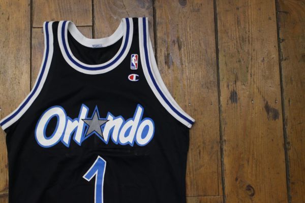 【古着GAME TOPSレア美品 Champion ORLANDO MAGIC ユニフォームタンクトップ黒#1】NBAバスケオーランド・マジックアンファニーハーダウェイ_画像1