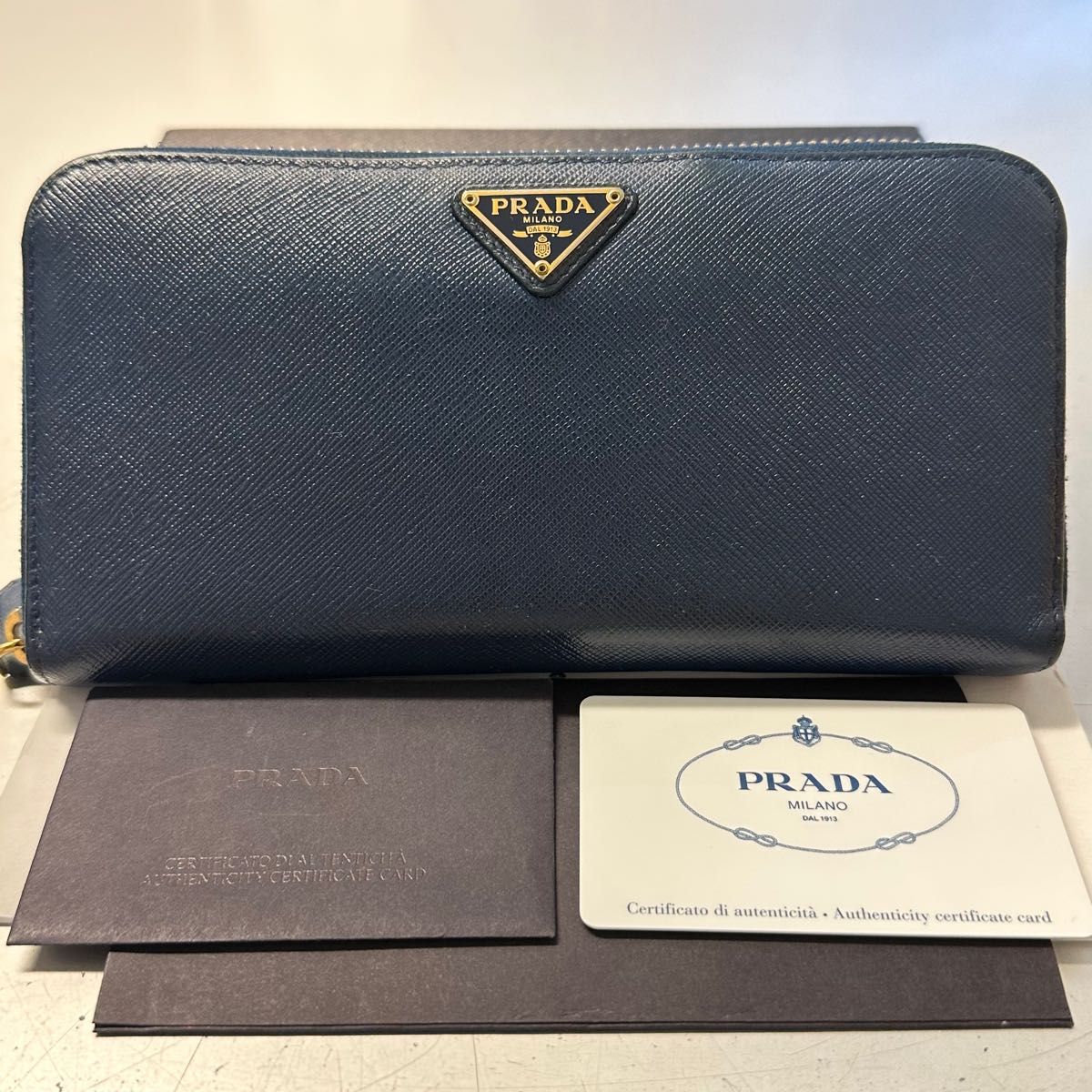 未使用に近い プラダ PRADA 財布 長財布 サフィアーノレザー ロゴ金具