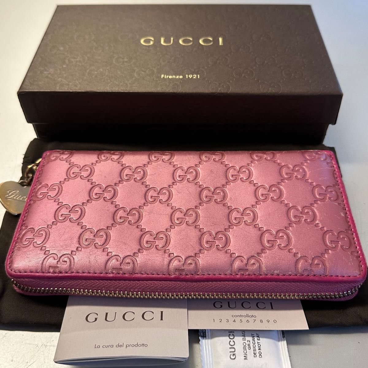 未使用に近い グッチ GUCCI 財布 長財布 シマレザー ハート金具