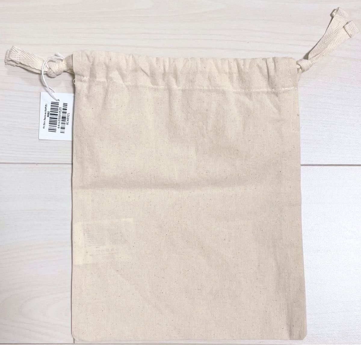 エレミス ELEMIS オーガニックコットン 巾着 ポーチ cottonbag 綿 ベージュ ロゴ タグ付き新品 有機 収納