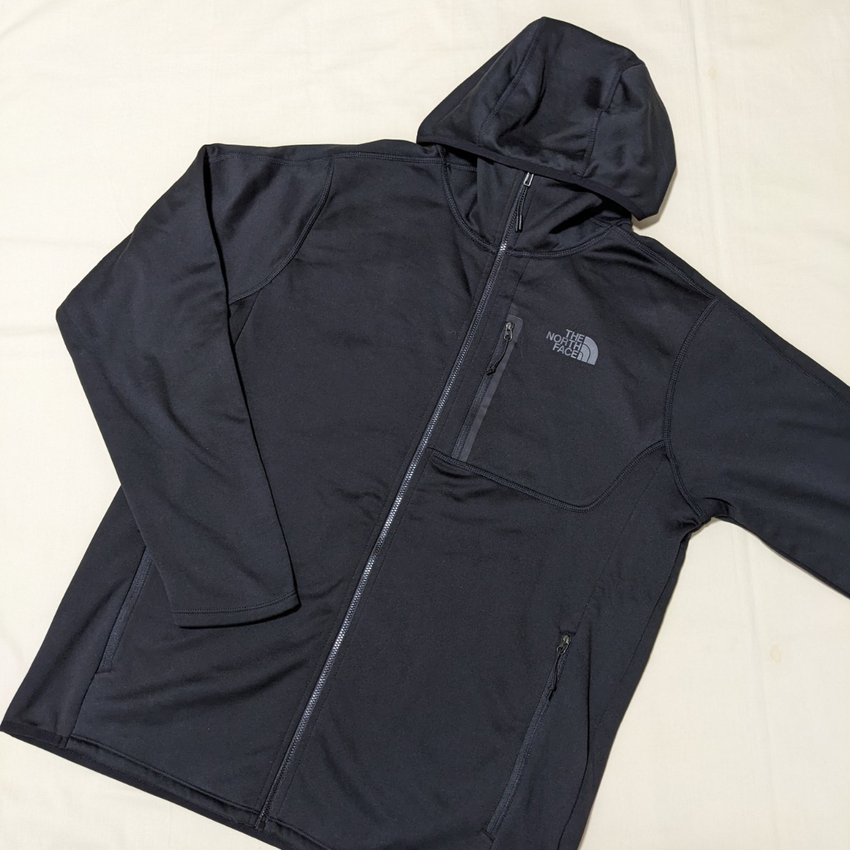 +WW25 THE NORTH FACE ザノースフェイス メンズ L 長袖 裏フリース パーカー ブルゾン 黒 フード付き アウトドア 軽量 防寒