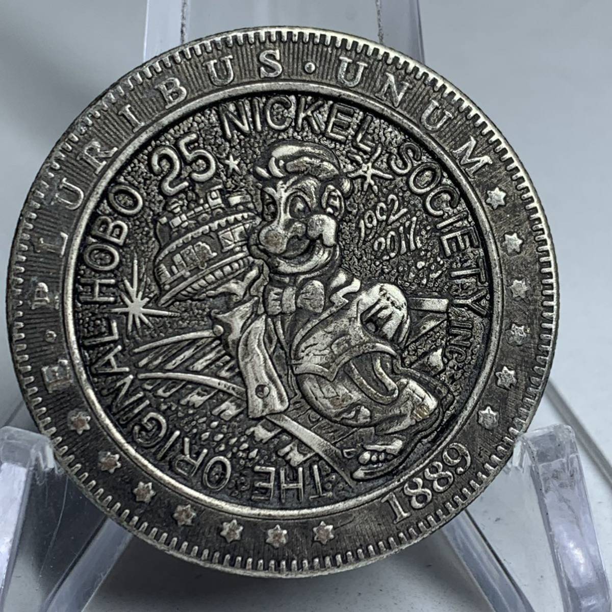 WX 1024流浪幣 ディズニー25周年 天眼 鷹紋 外国硬貨 貿易銀 海外古銭 コレクションコイン 貨幣 重さ約22g_画像1
