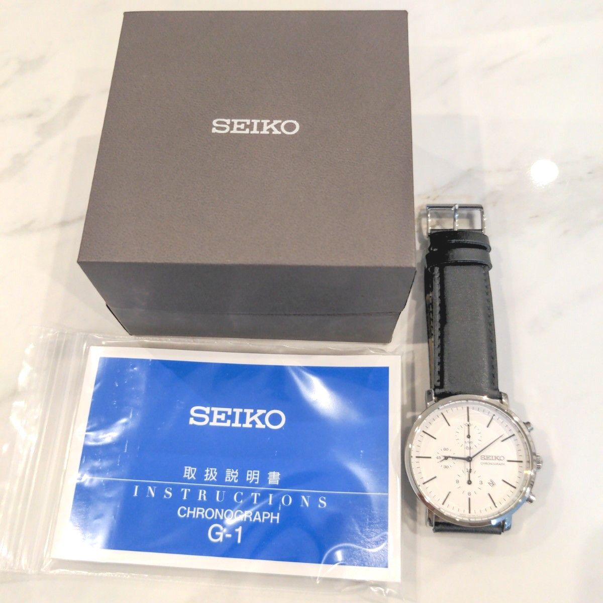 SEIKO ・クロノグラフ ・クォーツ電池式・デイト表示・白文字盤 SEIKO ・クロノグラフ ・クォーツ電池式・デイト表示・白文字盤