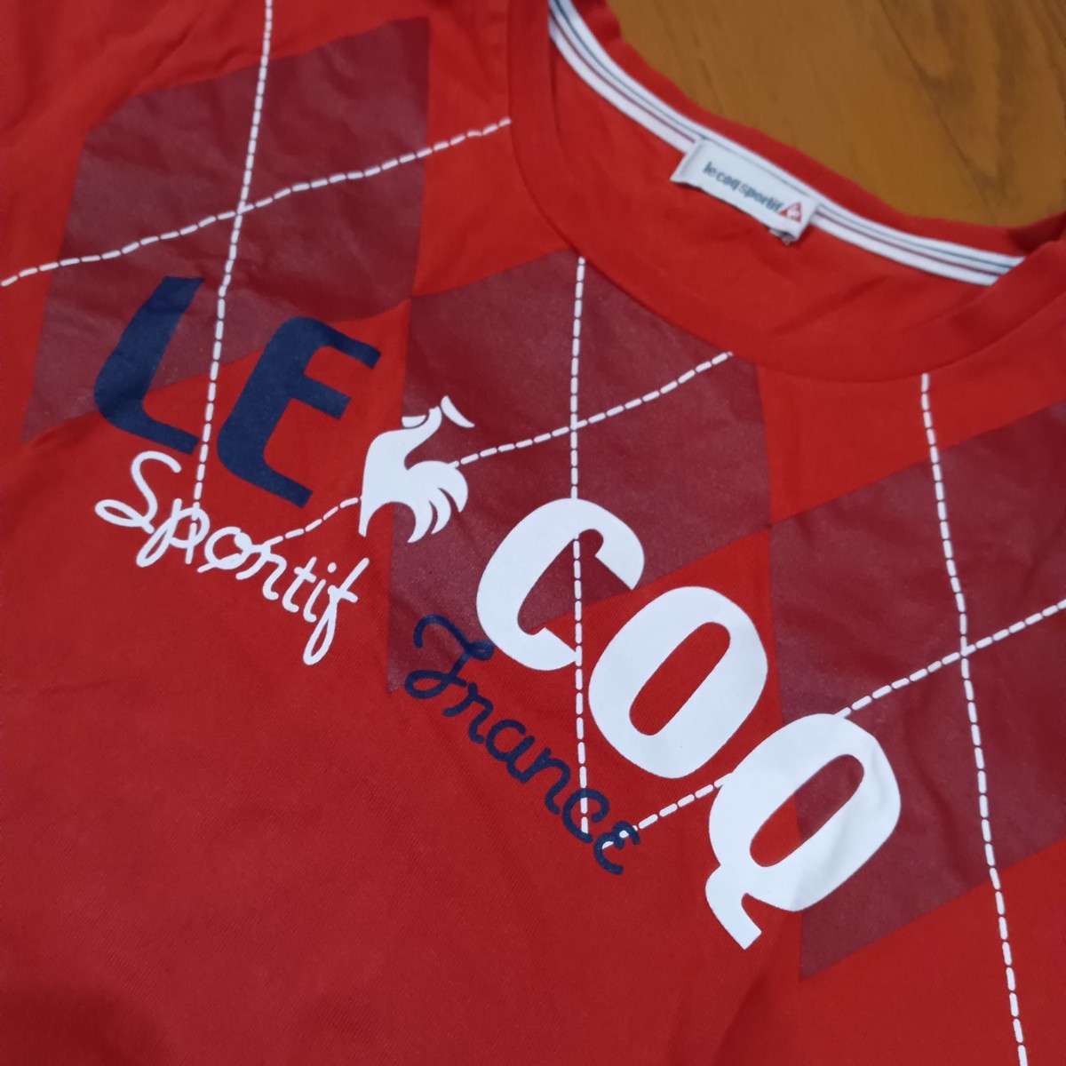 le coq sportif　ルコックスポルティフ　半袖Ｔシャツ　プリントＴシャツ　赤　レディスサイズＬ チビＴシャツ カットソー レッド 中古品　