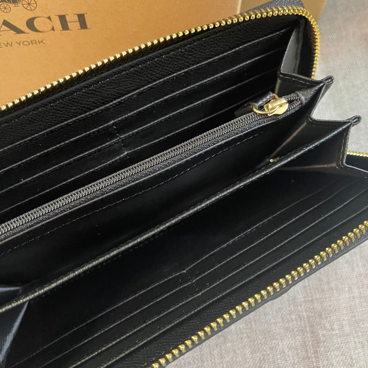 新品、未使用 COACHコーチシグネチャー ブラックロングウォレット 黒長