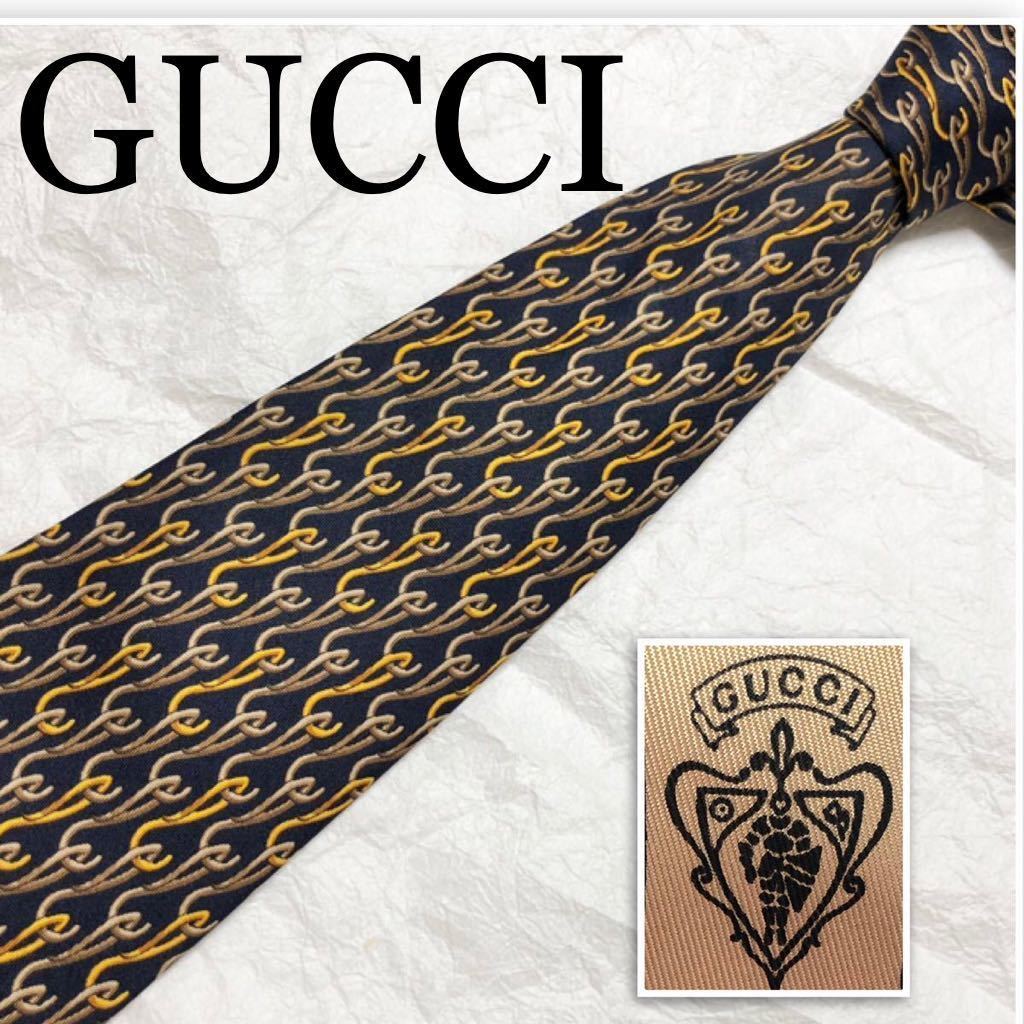 ■美品■GUCCI グッチ　ネクタイ　金具柄　総柄　シルク100% イタリア製　ブラック×ブラウン×イエロー