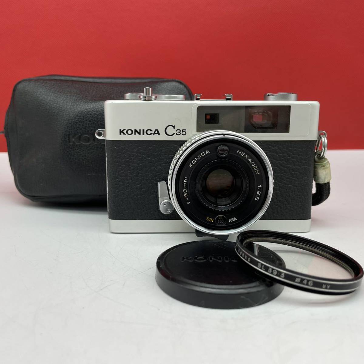 □ KONICA C35 HEXANON 38mm F2.8 レンジファインダー フィルムカメラ 動作確認済 露出計OK 現状品 コニカ_画像1