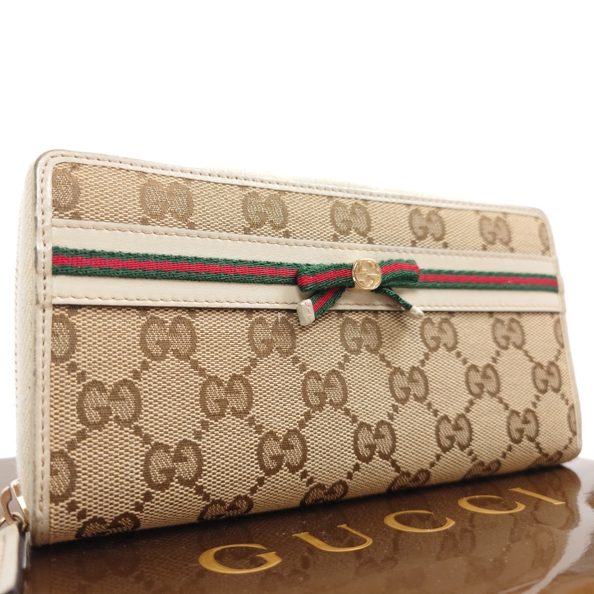 【美品】 GUCCI グッチ 長財布 ラウンドファスナー GG ロゴ シェリーライン リボン キャンバス ベージュ レディース_画像1