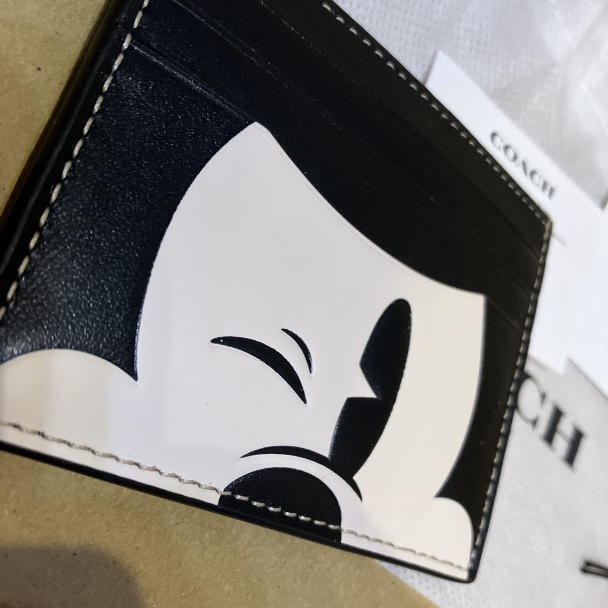 送料込●新品●COACH X ディズニー100周年コラボ 定期入 ウィンクミッキーA スリムIDカードケース2023年コラボ新作 ミッキーマウス 送料込●新品●COACH X ディズニー100周年コラボ 定期入 ウィンクミッキーA スリムIDカードケース2023年コラボ新作 ミッキーマウス