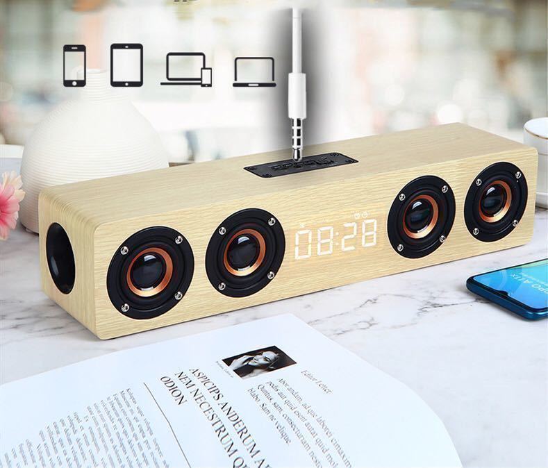  wireless speaker Wireless Bluetooth speaker height sound quality Bluetooth speaker wooden clock alarm eyes ... put clock 