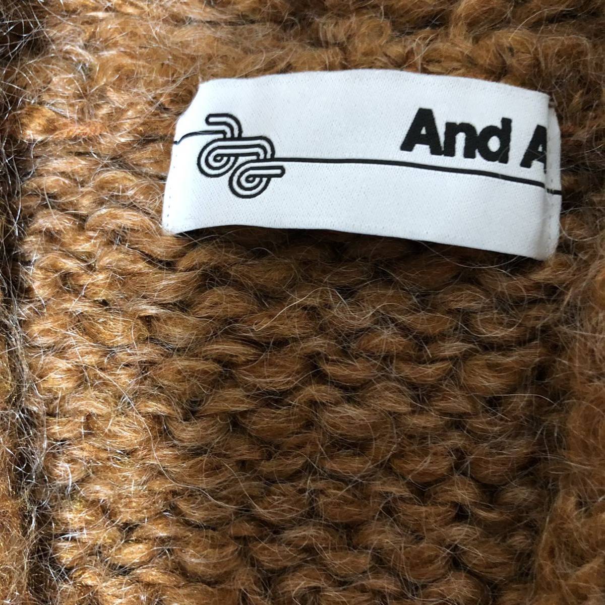 and A And A long cardigan Camel Brown knitted wool .