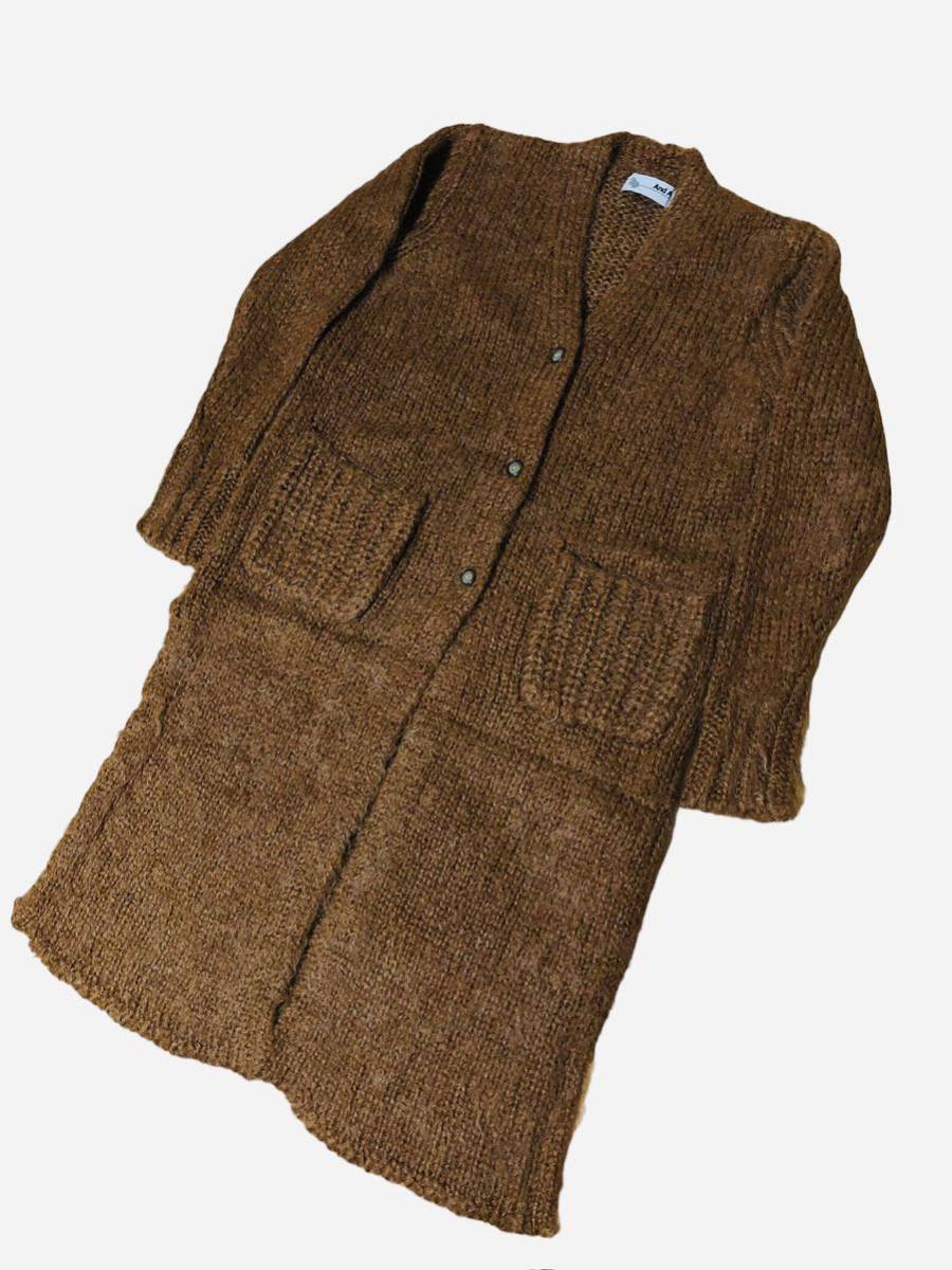 and A And A long cardigan Camel Brown knitted wool .