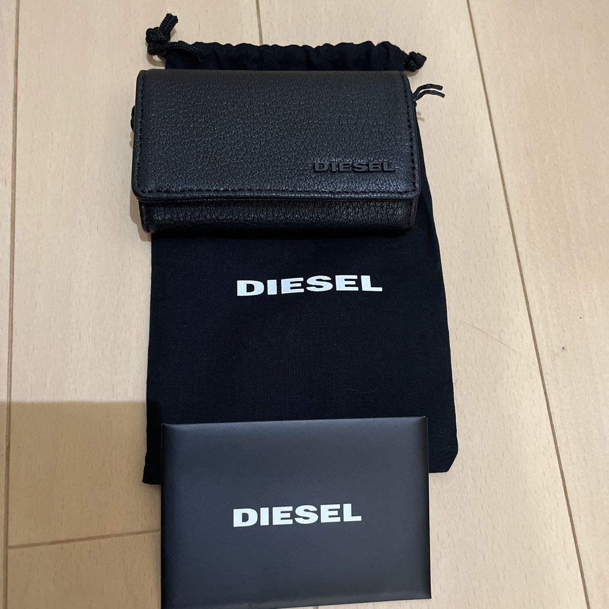  free shipping unused DIESEL diesel key case X06629 key ring attaching 6 ream black leather storage bag attaching 