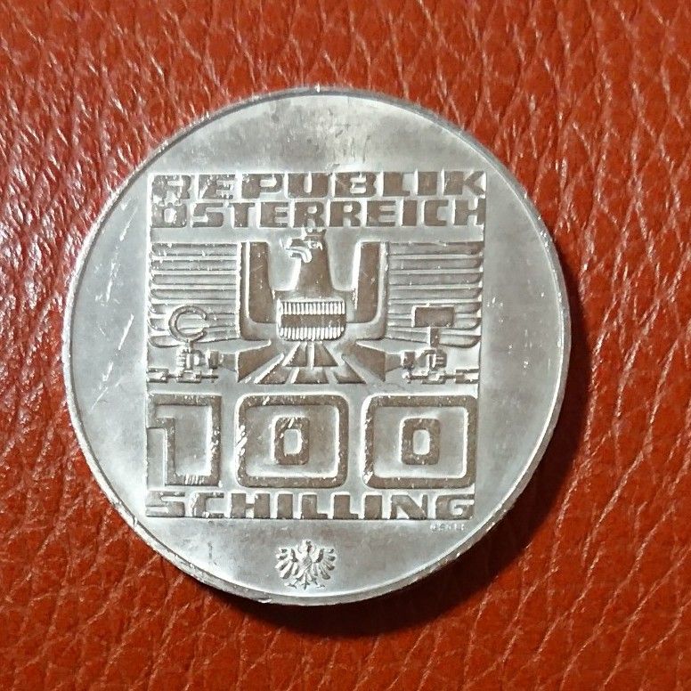 ①(1976年)オーストリア インスブルック冬季オリンピック記念100シリング大型銀貨