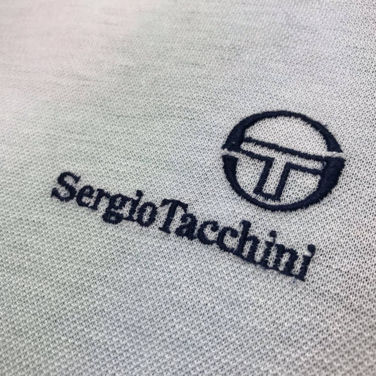 レア80s VINTAGEアーカイブ Sergio Tacchiniセルジオ タッキーニ クリーニング済 内野製 BIG FIT 清涼 スプレーアート テニス ポロシャツLL_上品な【ST】シグネチャーロゴ刺繍です。