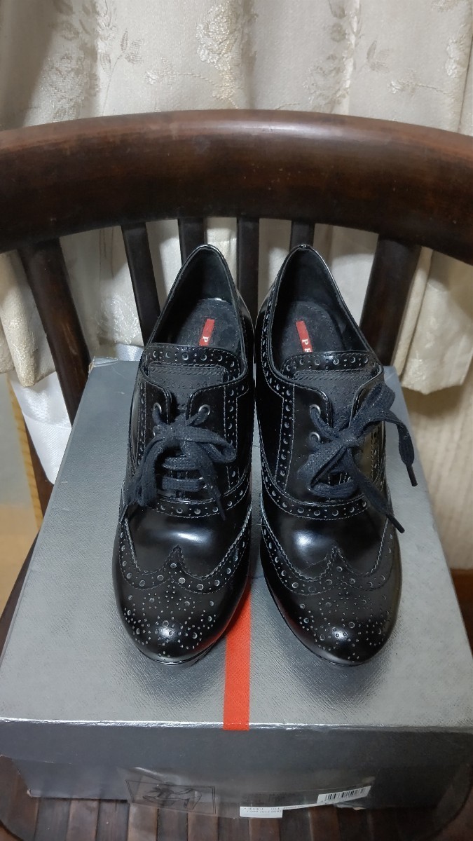 PRADA 黒のウイングチップブ－ティ－38