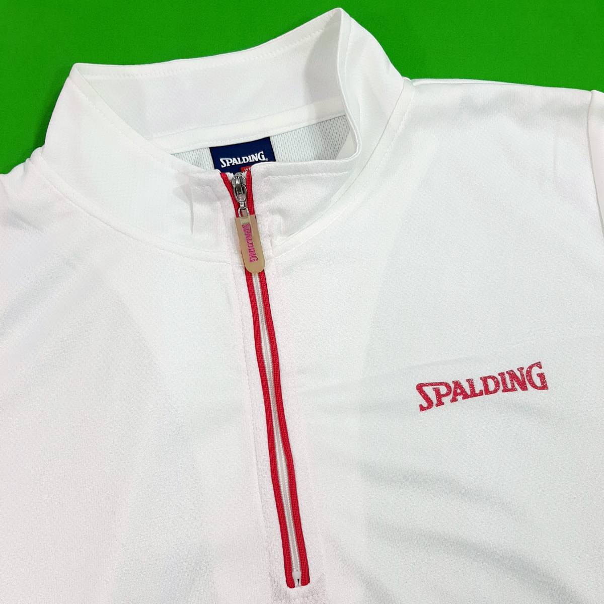 S9美品★送料込★SPALDING★吸汗速乾生地 ハーフジップ スタンドカラー ストレッチ半袖Tシャツ スポーツ★女性Lサイズ ホワイト白色