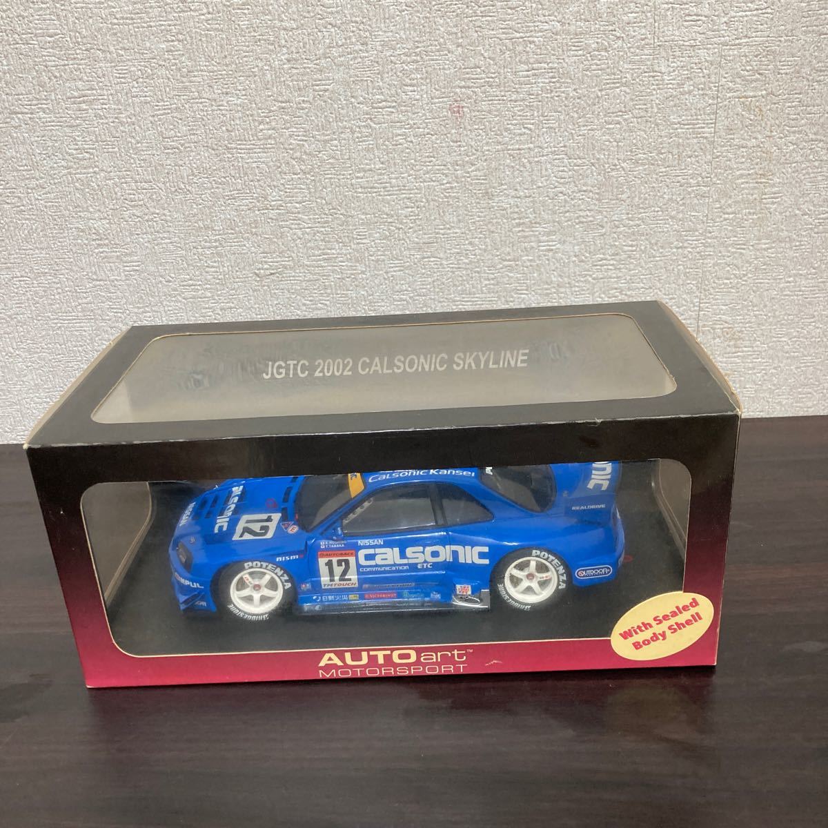 未使用　現状渡し　長期保管品　オートアート　AUTO art 1/18？　箱サイズ　32.5×16.5×14 JGTC 2002 CALSONIC SKYLINE スカイラインGT-R _画像1