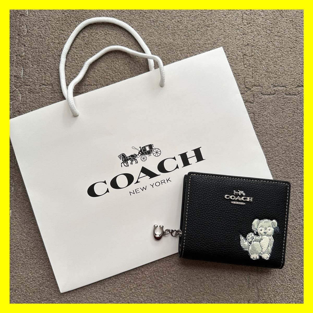 話題の行列 新品未使用 COACH スナップ ウォレット・ハッピー ドッグ