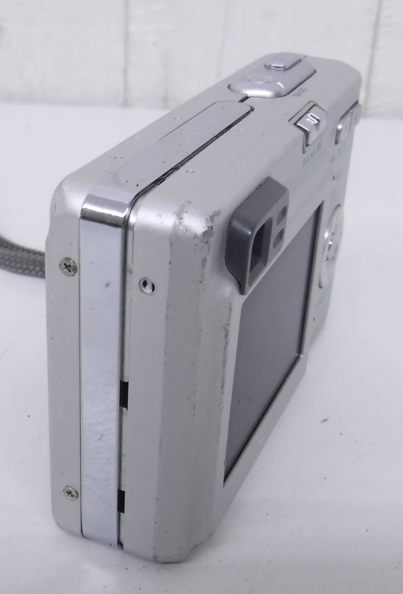 コンパクトデジタルカメラ ＊CASIO EXLIM MEGA PIXELS 3.2 ＊MOBILE CHARGER　BC-10L ＊LITIUM ION BATTERY NP-20 ＊日本製 ＊ジャンク品_本体のネジが1本欠品、浮きが有ります。
