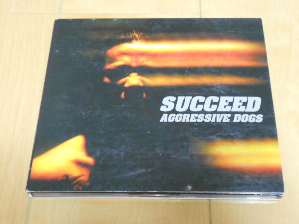 CD「SUCCEED/AGGRESSIVE DOGS」アグレッシブドッグス_画像1