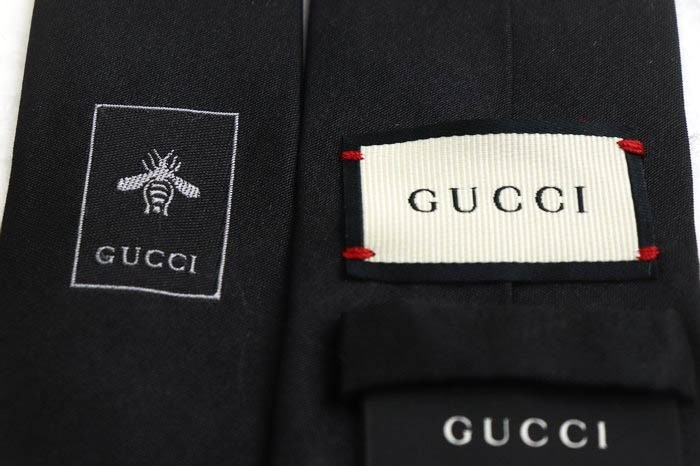 グッチ 無地ソリッド クレスト紋章 伊製生地 高級 イタリア製 ブランド ネクタイ メンズ ブラック GUCCI_画像2