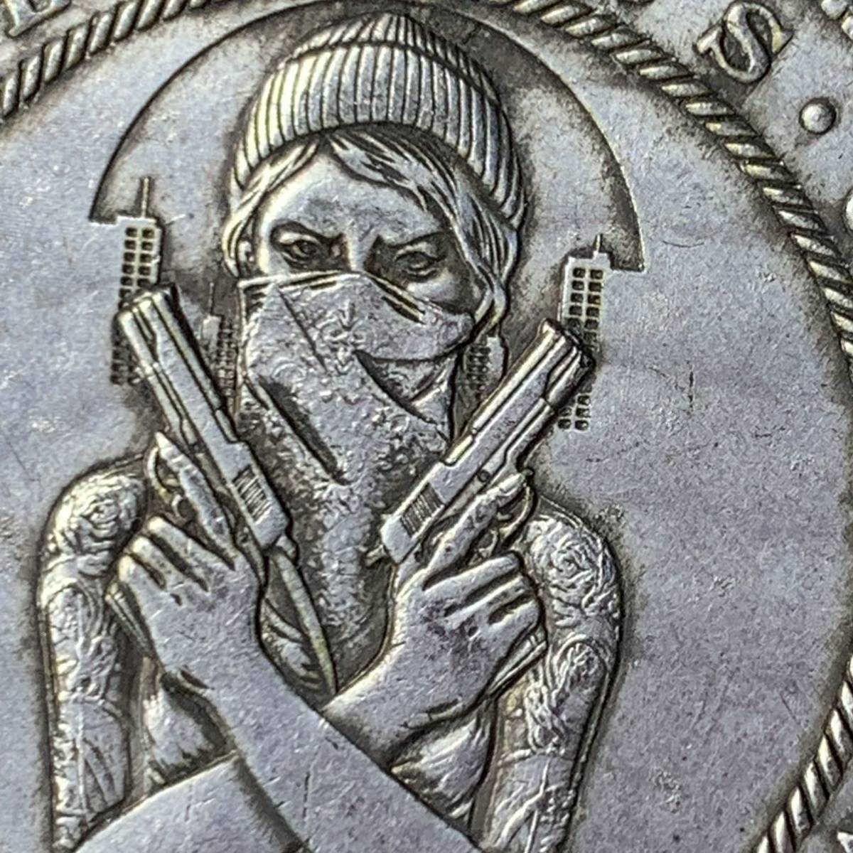 WX1112流浪幣 スナイパー女 天眼 鷹紋 外国硬貨 貿易銀 海外古銭 コレクションコイン 貨幣 重さ約25g_画像2