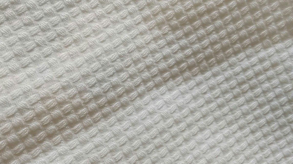 美品23区ゴルフウェアハーフパンツキュロットパンツ白 ホワイト編み模様