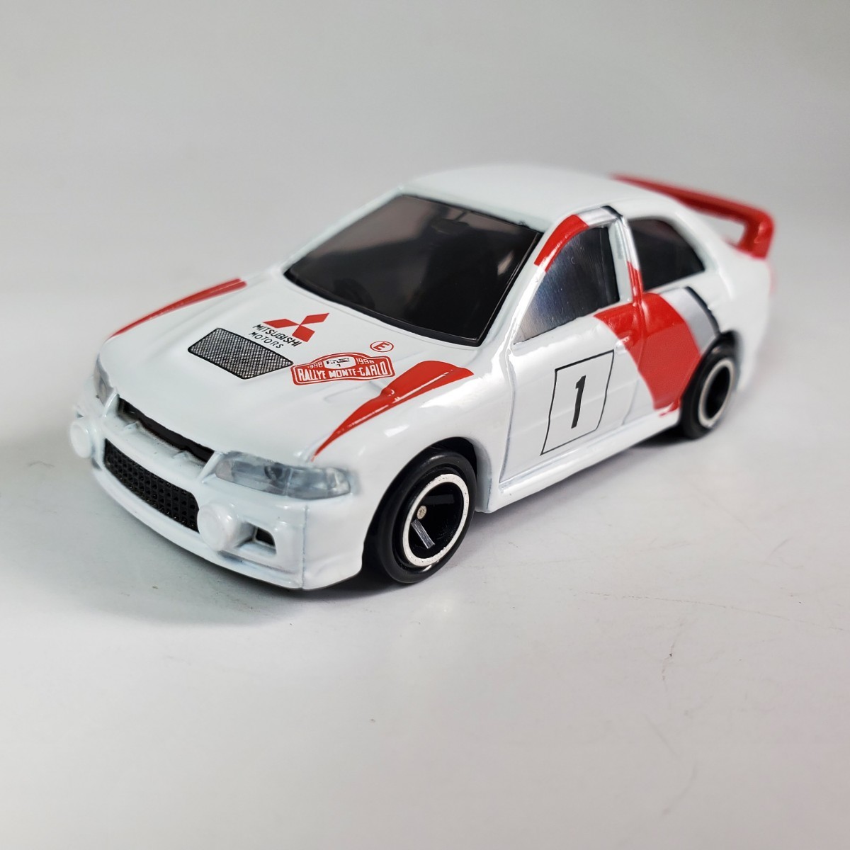 トミカ 1/59 NO.104「 MITSUBISHI LANCER エボリューションⅣ WRC TYPE 初回限定 メタルバッチとデカール入り」ランエボ Ⅳ 良品 515_画像6