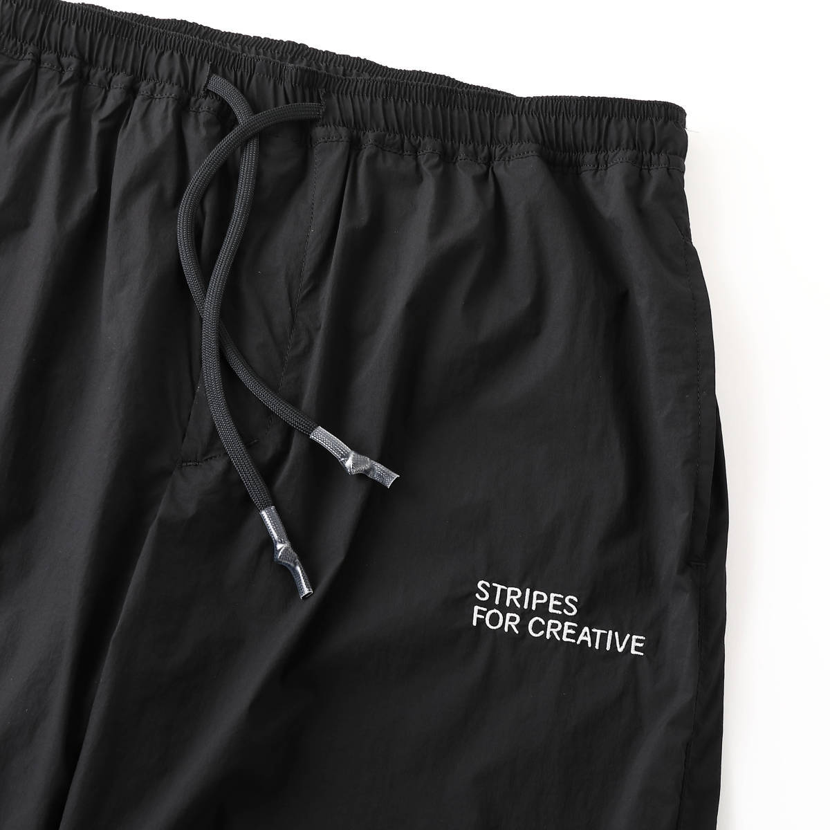 STRIPES FOR CREATIVE◇S.F.C ウインドブレーカーパンツ/黒L-日本