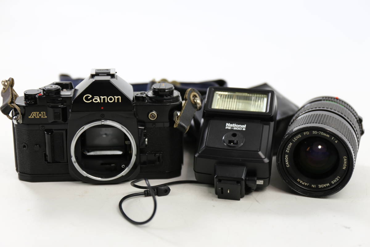管101304/キヤノン Canon A-1 + FD 35-70mm F4 PE-2000S付/動作未確認ためジャンク扱い/外観美品