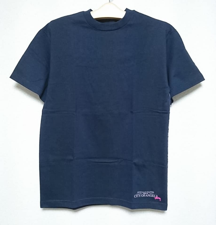 超爆レア！新品タグ付き！STUSSY ステューシー/背面ドクロ総柄プリント/シティーオブエンジェルス限定Tシャツ M ネイビー 入手困難！_フロントデザイン