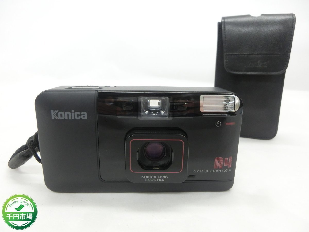 【H2-0063】Konica コニカ A4 35mm F3.5 フィルムカメラ コンパクトカメラ ケース付 通電確認済 現状品【千円市場】_画像1