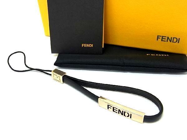 ■美品■ FENDI フェンディ レザー ゴールド金具 携帯ストラップ チャーム レディース ブラック系 DD1092_画像1