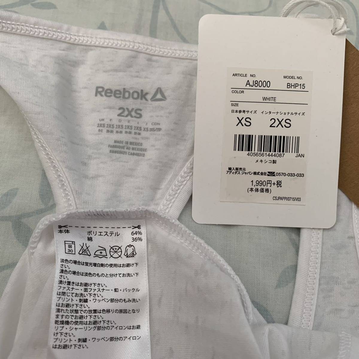 P【新品】爽やかな白★綺麗な透かし柄《Reebok／リーボック 》美スタイル・トップス　XS〜S タンクトップ フィットネスウェア　スポーツ