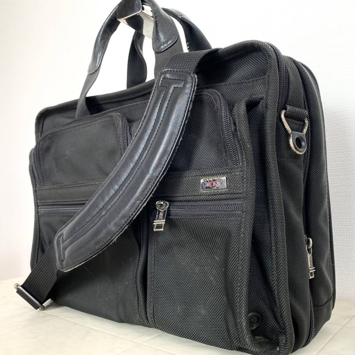 送料無料】 【極希少・美品】 TUMI 仕事鞄 通勤 メンズ レザー PVC