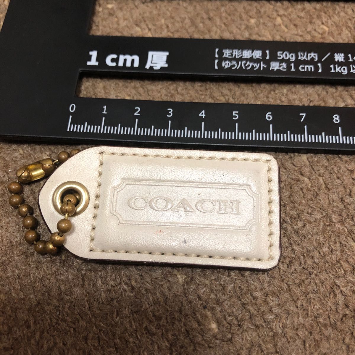 coach コーチ　白　クリーム色　バックチャーム　キーホルダー