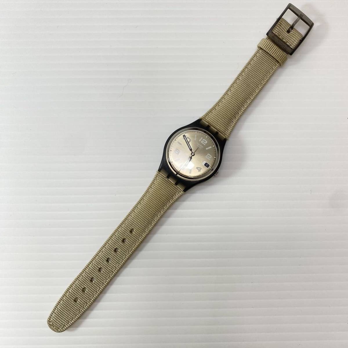 swatch スウォッチ 腕時計 クオーツ 電池式 3針 アナログ デイト カレンダー ケース付き PAMPA’S RIDER GM414 動作品_画像2