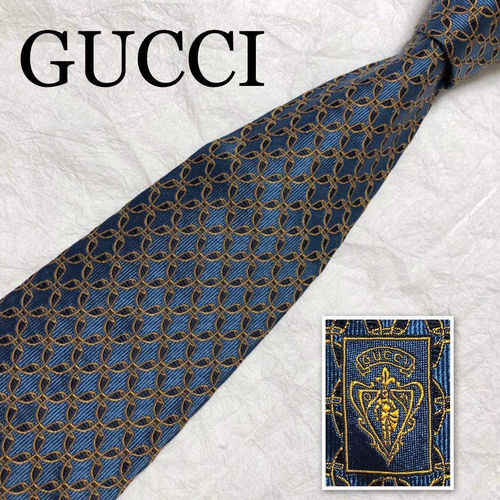 ■美品■GUCCI グッチ　ネクタイ　円　サークル　総柄　シルク100% イタリア製　ブルー系×ゴールド　ビジネス_画像1