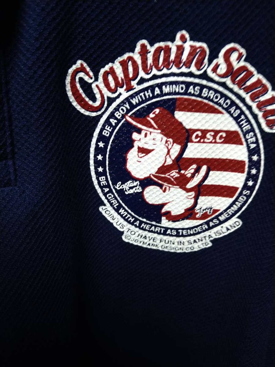 HPS３１半袖ポロシャツ刺繍・ペイント入り　CAPTAIN　SANTA　L　紺色系 　綿　日本製　中古良品１枚_画像2