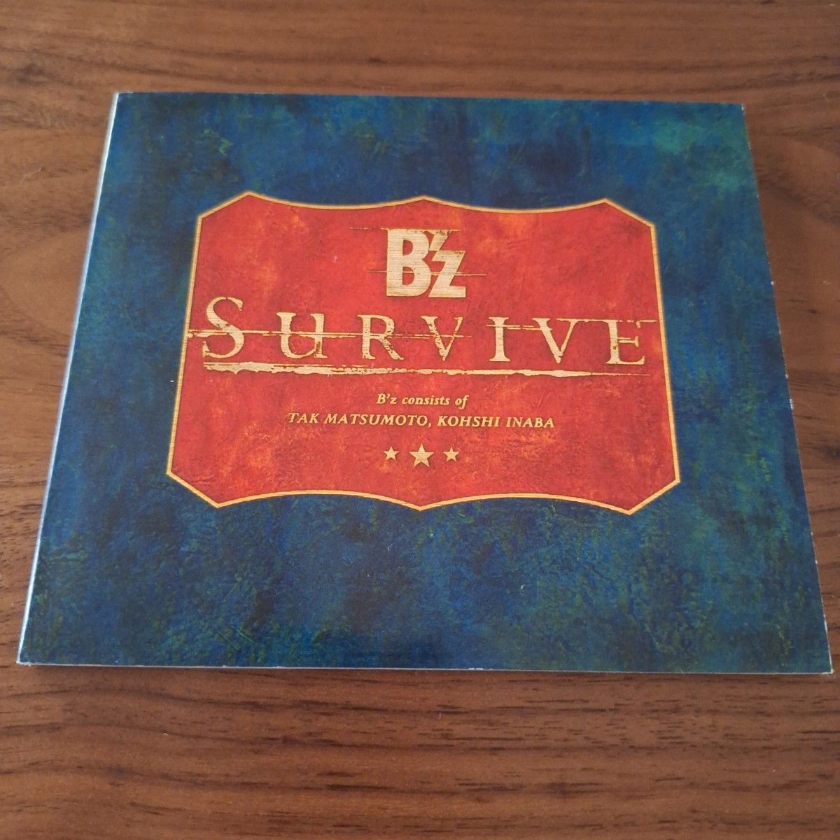 B'z　CD『SURVIVE』[三方背スリーブケース付き]　BMCR-7022　1997年リリース