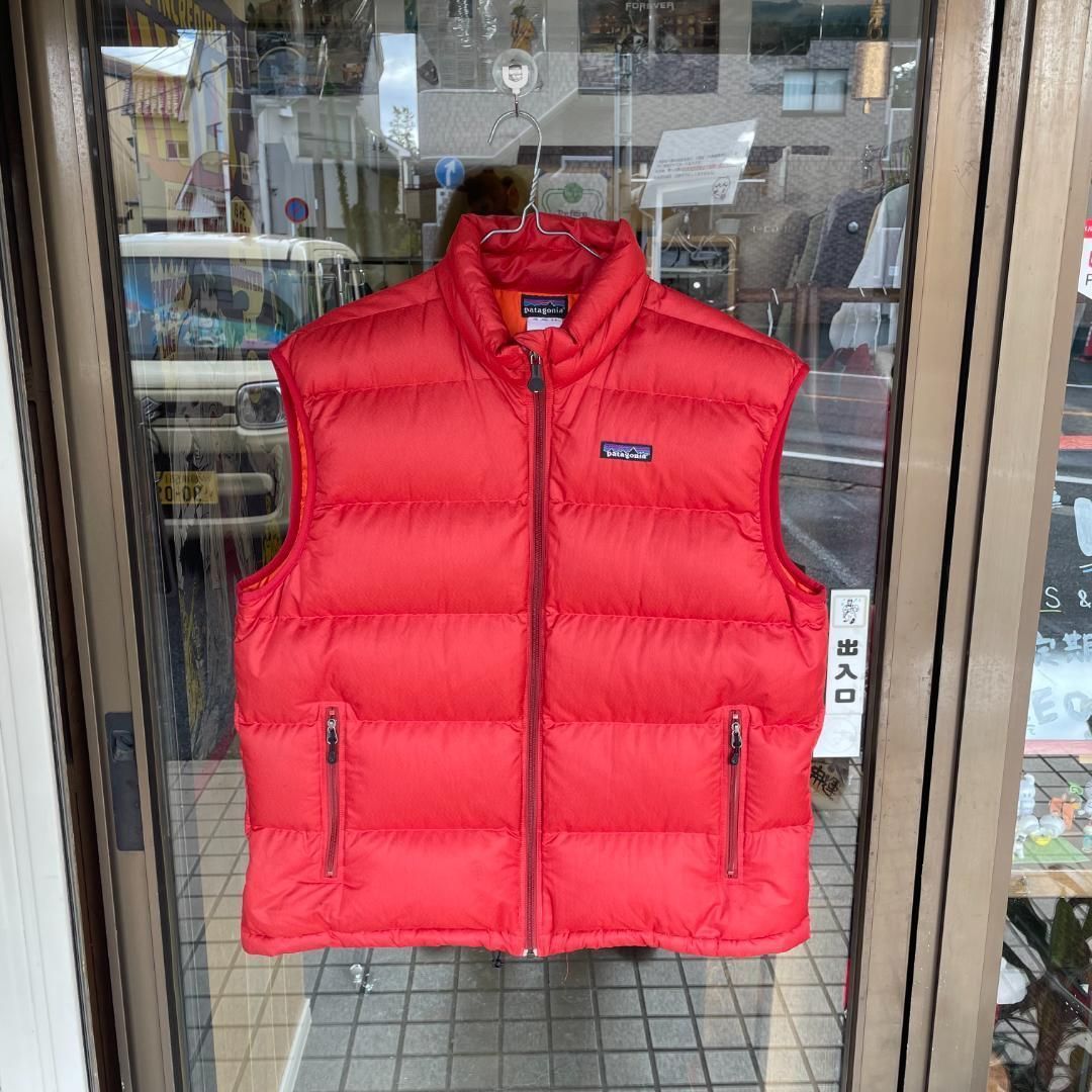 古着 Patagonia パタゴニア ダウンベスト オレンジ Lサイズ アメカジ アウトドア ゴールデンサイズ 84630F4_画像1