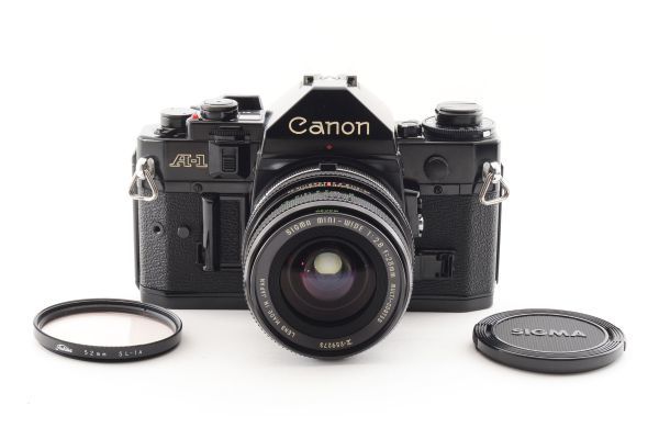 #2540 キャノン CANON A-1 + sigma 28mm F2.8 フィルム 一眼レフ カメラ [動作確認済] シャッター鳴き無し