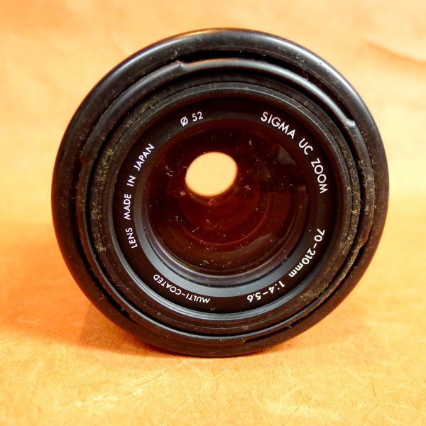 i332 SIGMA UC ZOOM 70-210 1:4-5.6 auto focus lens size : calibre approximately 5.2cm height approximately 9cm/60
