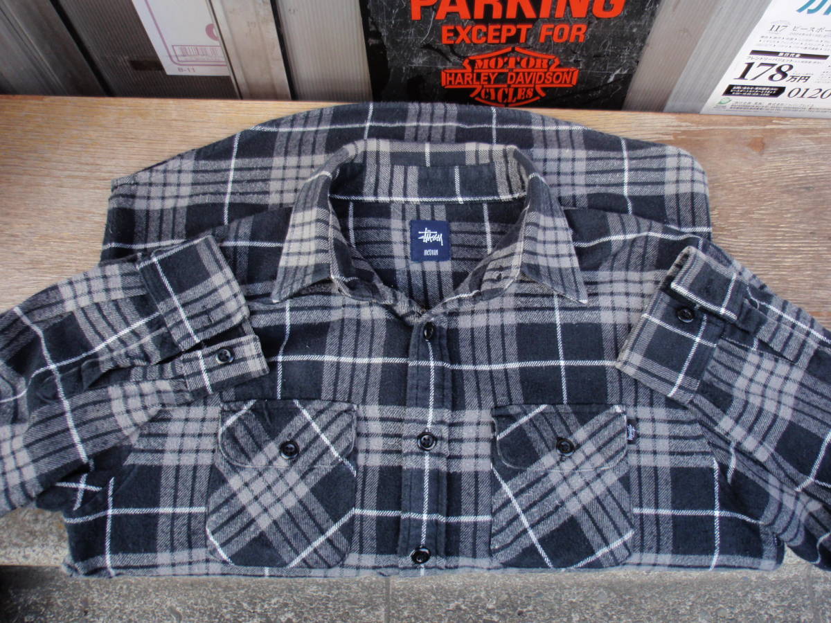 Stussy black check pattern . flannel shirt size L?