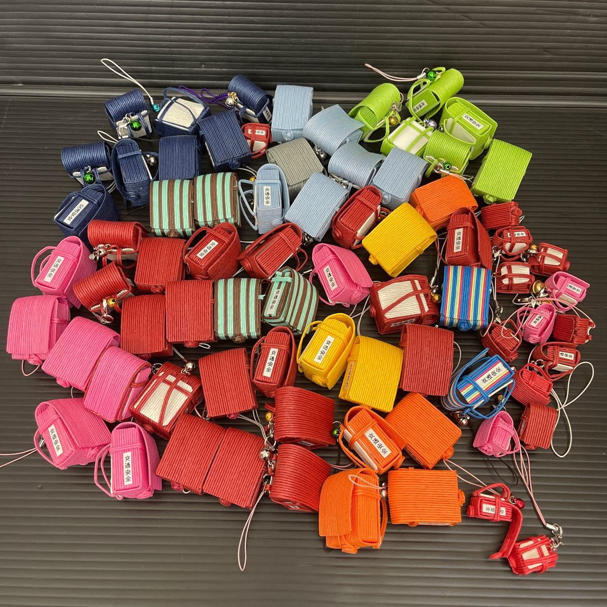  hand made craft paper-backed tape Mini knapsack strap bell attaching final product traffic safety go in . volunteer in present . total 75 piece 